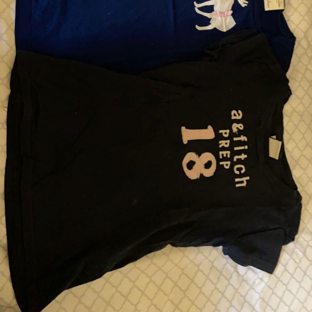 A pack of Abercrombie Kids shirts